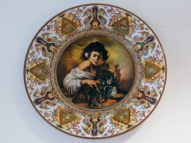 pottery inspired by the Boy bitten by a lizard by Caravaggio