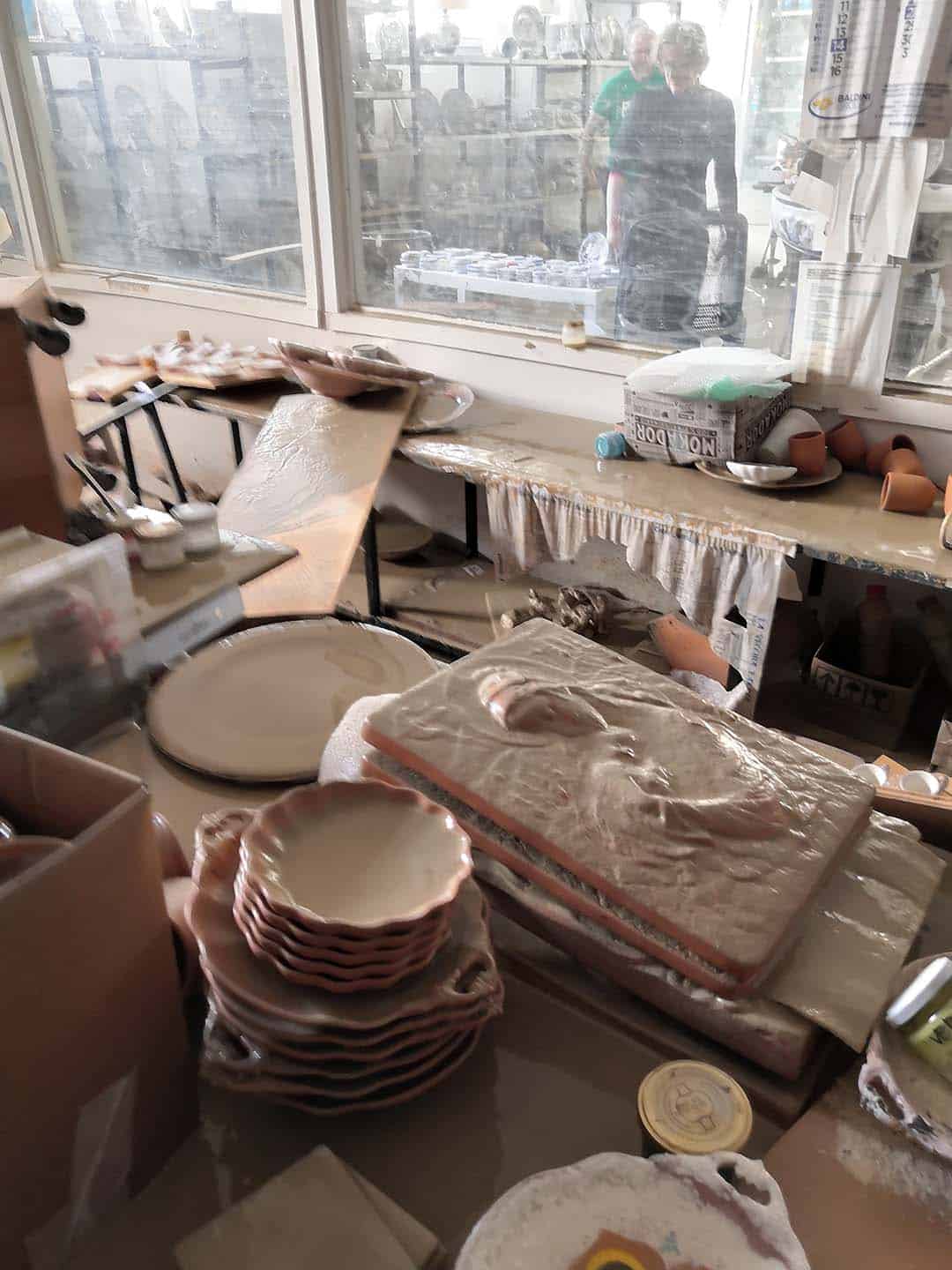 the pottery covered in mud after the flood 2023